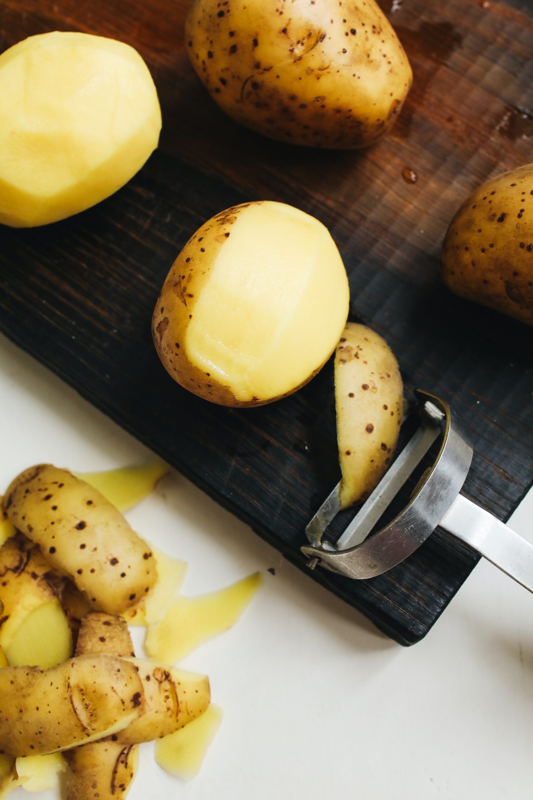 potatoes being peeled